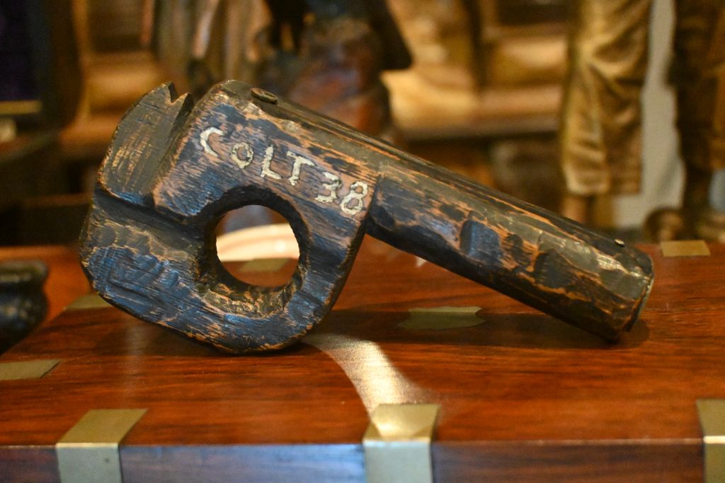 Charles's authentic Dillinger handmade wooden gun — COLT .38 side